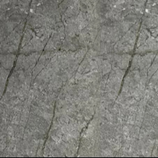 Close-up seamless texture of a gold and grey marble PVC wall cladding board, featuring organic dark veining and subtle gold undertones for high-end interior surfaces.