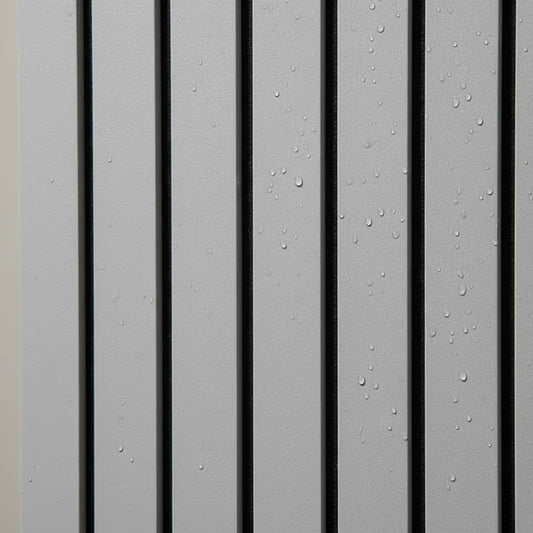 Close-up detail of water-resistant dark oak PVC slat panel showing a realistic wood grain texture with water droplets for interior wall cladding.