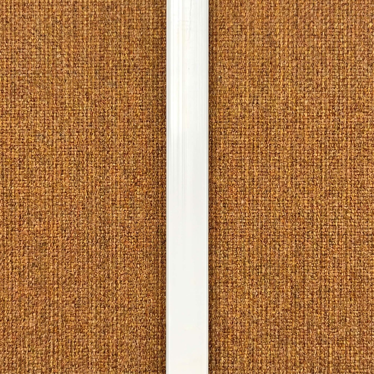 High-end trimless white LED light strip perfectly aligned and embedded vertically into an acoustic wood panel slat groove for hidden visibility.