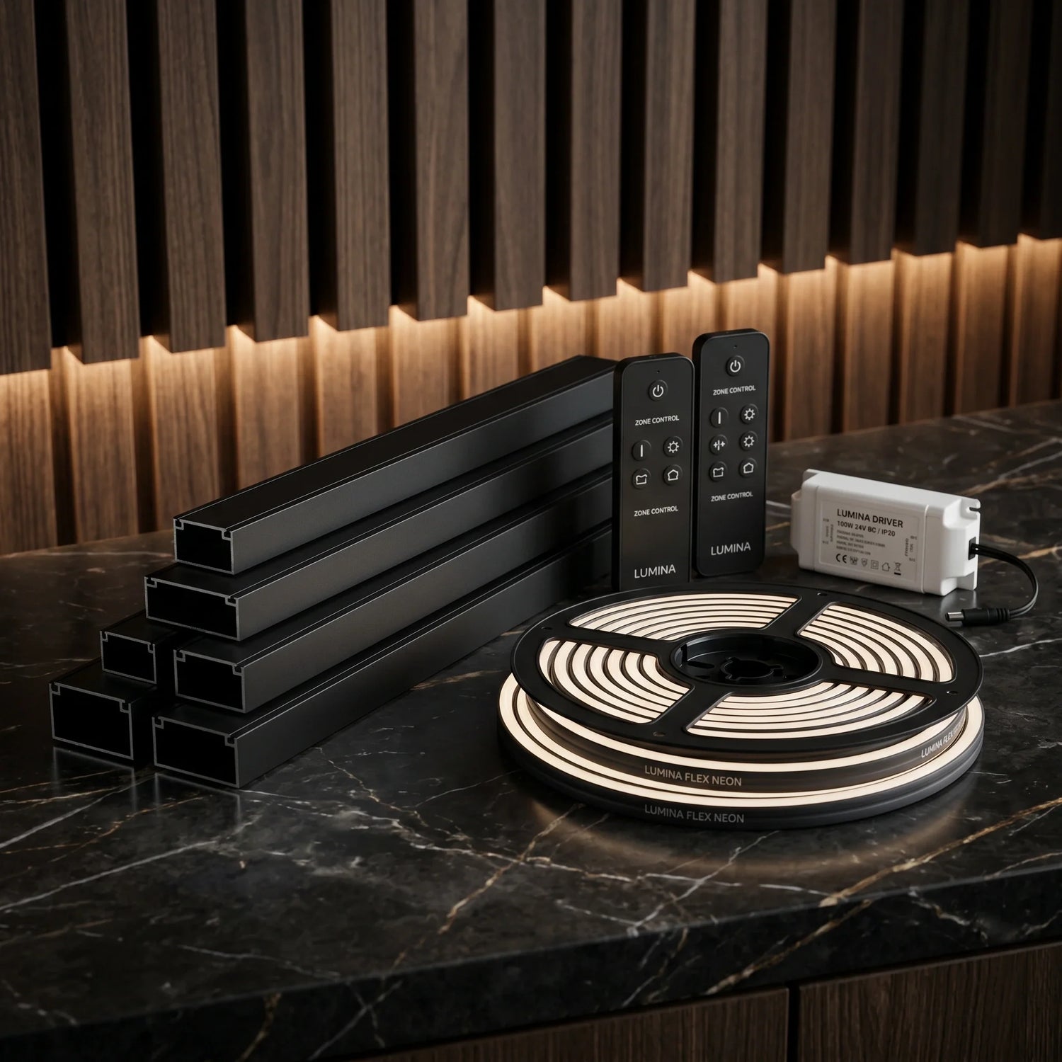 Slat wall panel LED lighting kits collection displaying black profiles, a flexible neon light roll, controllers, and a power driver on marble.