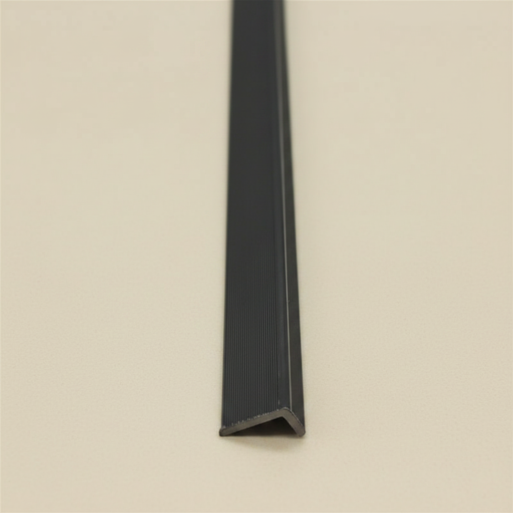 A vertical perspective of a 240cm Black architectural trim, showcasing its sleek L-profile and high-quality composite build for modern outdoor design.