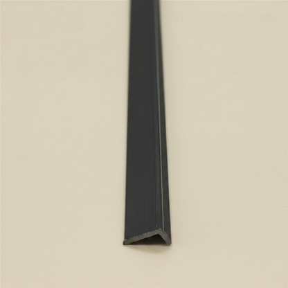 A vertical perspective of a 240cm Black architectural trim, showcasing its sleek L-profile and high-quality composite build for modern outdoor design.