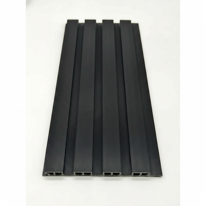 Top-down close-up of a Black 240cm WPC outdoor panel showing the 2.4cm fluted slat profile and hollow-core weather-resistant engineering.