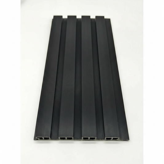 Top-down close-up of a Black 240cm WPC outdoor panel showing the 2.4cm fluted slat profile and hollow-core weather-resistant engineering.