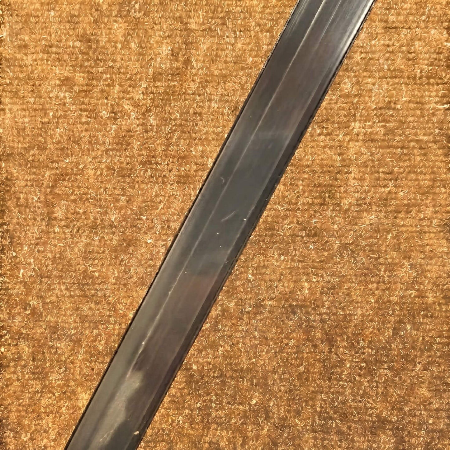 Architectural black aluminum LED channel showing a 7mm shallow deep profile designed for completely hidden visibility inside wood slat wall groove gaps.