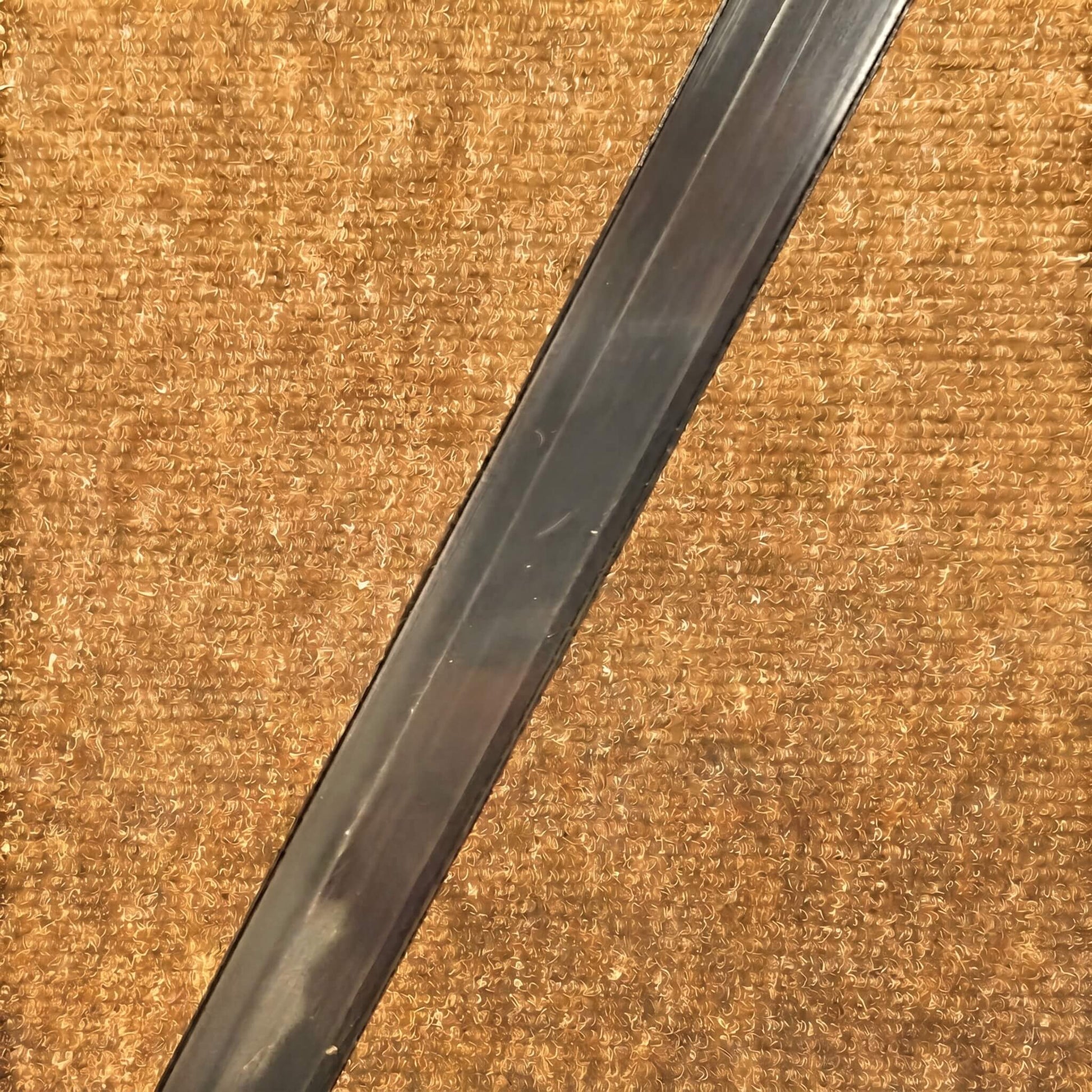 Architectural black aluminum LED channel showing a 7mm shallow deep profile designed for completely hidden visibility inside wood slat wall groove gaps.