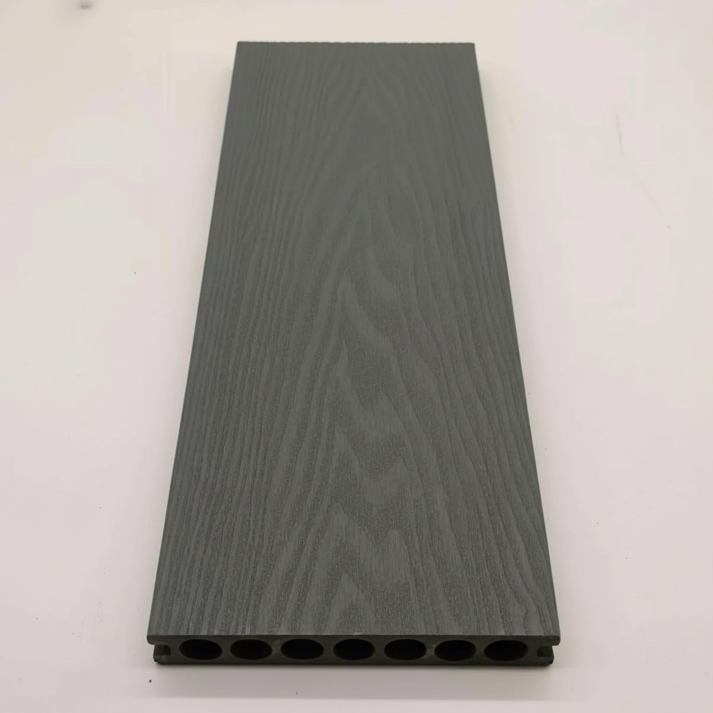 Close-up of Grey composite decking board showing authentic wood grain texture detail.