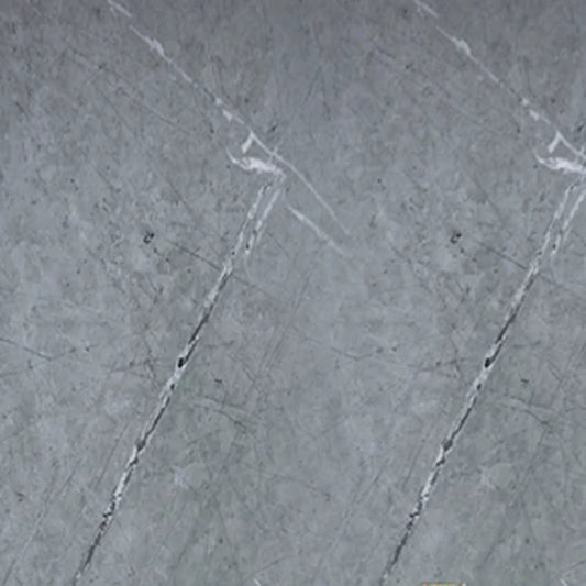 Close-up texture of a grey marble PVC wall cladding board, showing realistic white and dark grey veining for modern interior design.