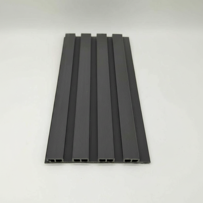 Top-down close-up of a Grey 240cm WPC outdoor panel highlighting the urban charcoal finish and interlocking architectural design.