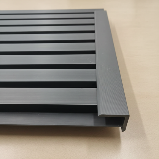 Seamless Grey wall panel trim installation showcasing a professional flush finish against wood slat panels.