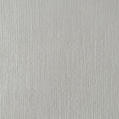 High-resolution macro zoom demonstrating the realistic architectural wood grain texture on the decorative finish of a grey premium SPC wall board.