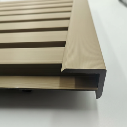 Close-up of a Khaki trim providing a seamless and clean edge finish for horizontal slat wall panels.