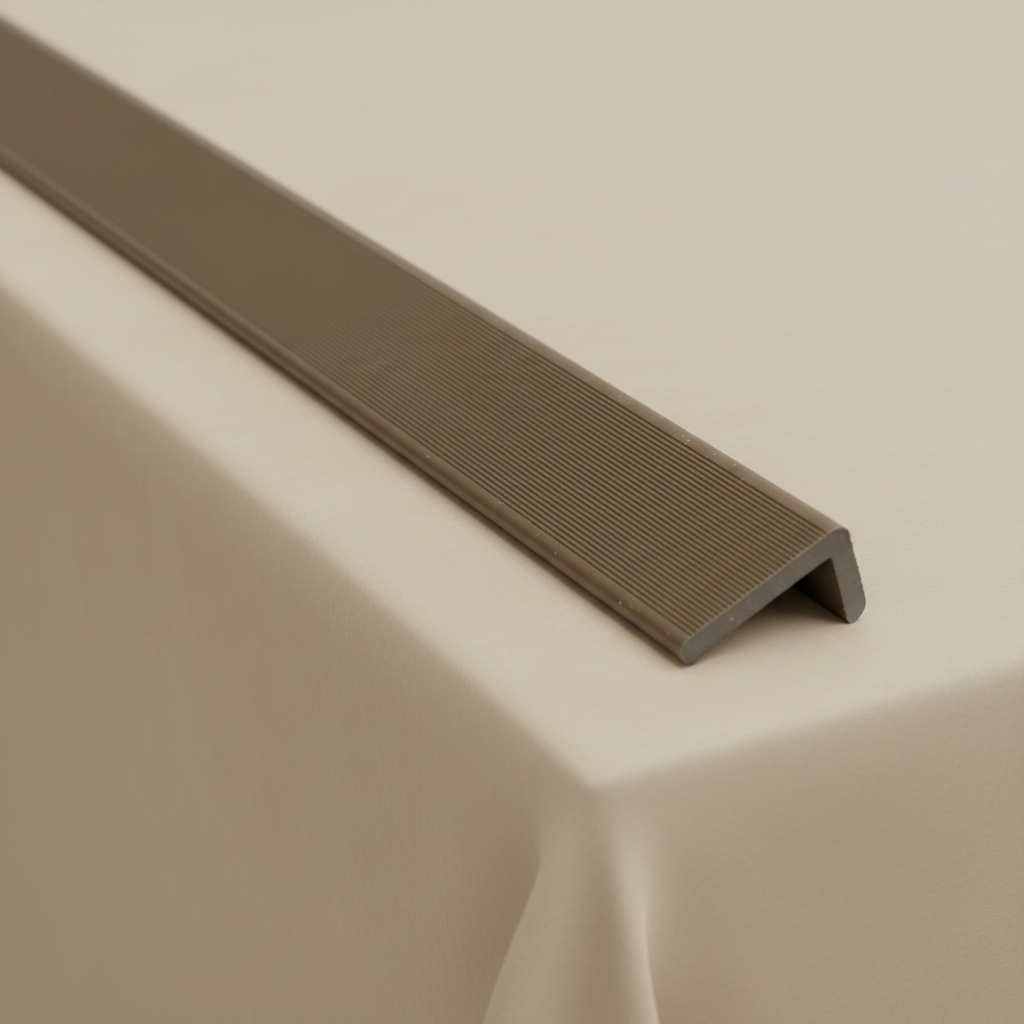 Detailed close-up of the Light Brown composite edge trim's profile, designed for long-lasting UV resistance and professional wall cladding finishes.