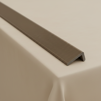 Detailed close-up of the Light Brown composite edge trim's profile, designed for long-lasting UV resistance and professional wall cladding finishes.