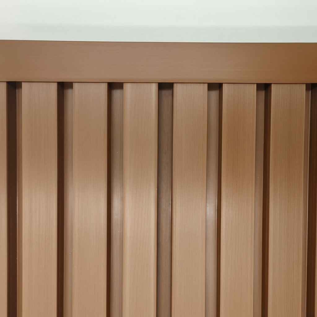 Light Brown trim seamlessly installed on a matching vertical slat wall panel, providing a professional and clean edge finish.