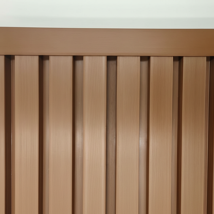 Light Brown trim seamlessly installed on a matching vertical slat wall panel, providing a professional and clean edge finish.