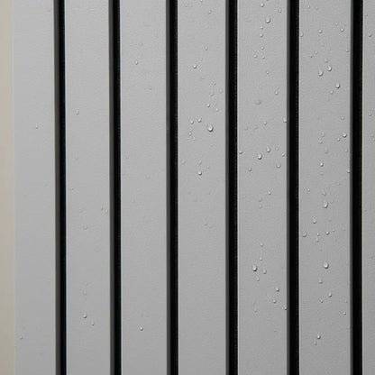 Close-up detail of water-resistant dark oak PVC slat panel showing a realistic wood grain texture with water droplets for interior wall cladding.