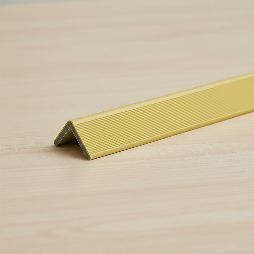Close-up shot of the Oak wall panel trim's L-shaped profile, designed for seamless edge protection on outdoor cladding.
