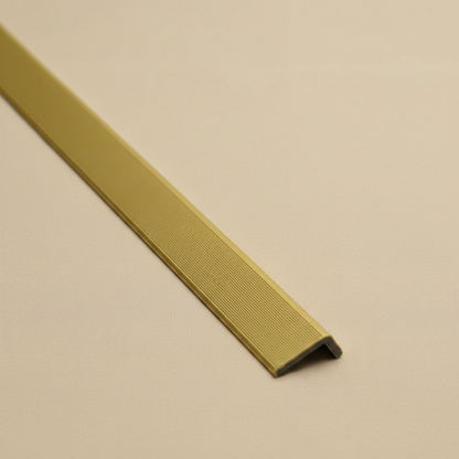High-angle view of a 240cm Oak architectural trim, highlighting its durable composite texture and clean L-profile.