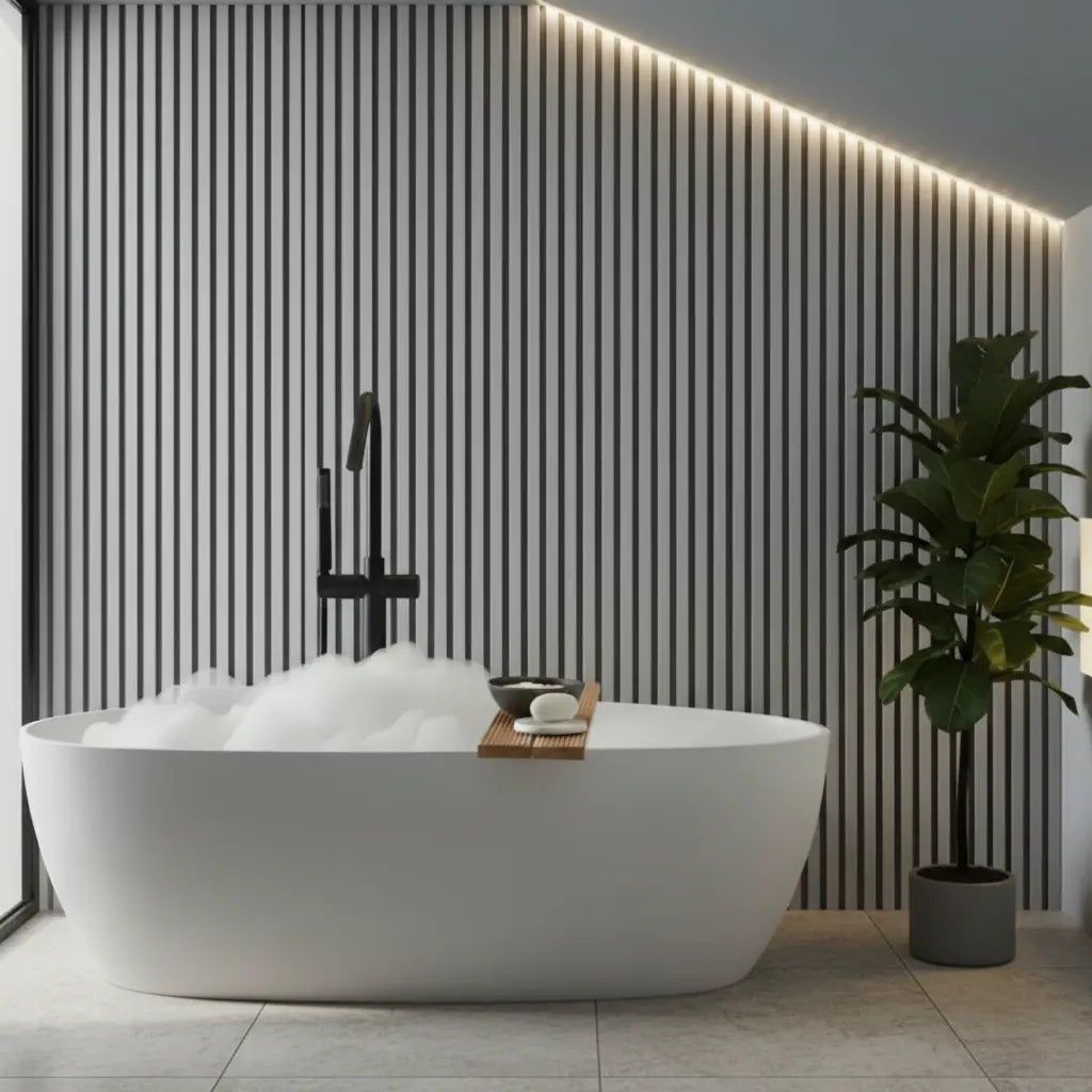 Moisture-resistant light grey PVC slat panel close-up, showcasing vertical lines and water-resistant surface texture for minimalist wall paneling.