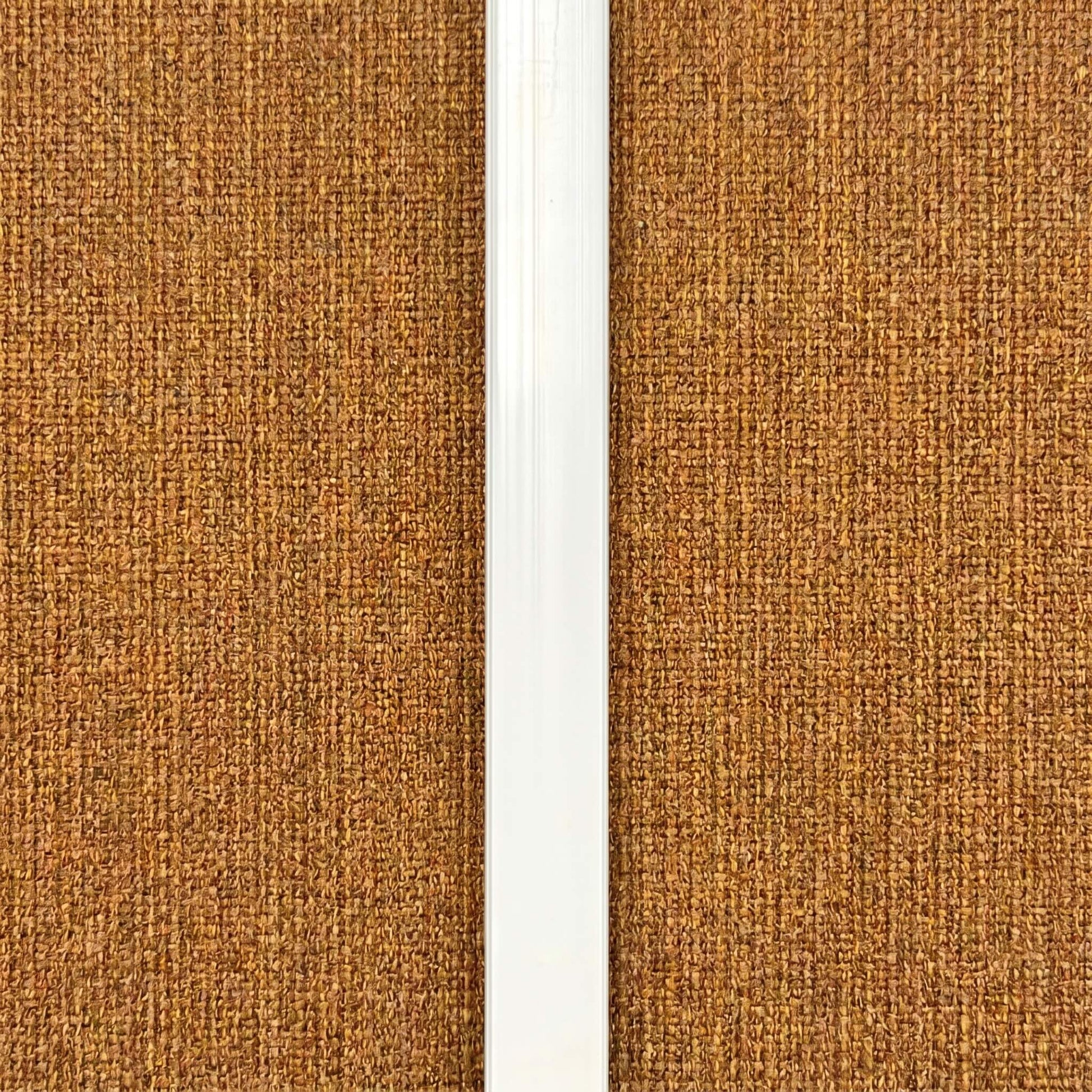 High-end trimless white LED light strip perfectly aligned and embedded vertically into an acoustic wood panel slat groove for hidden visibility.