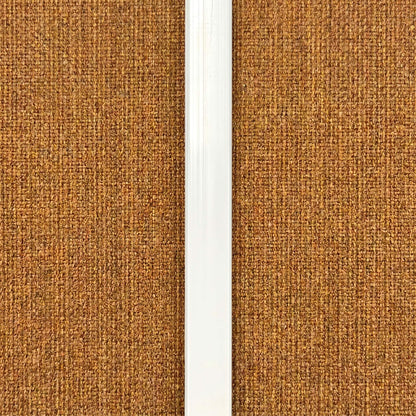 High-end trimless white LED light strip perfectly aligned and embedded vertically into an acoustic wood panel slat groove for hidden visibility.