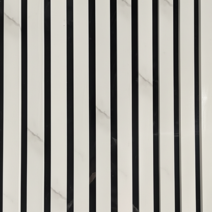 Close-up detail of Churchill Panels White Marble slat wood panel showing the realistic grey marble veining and premium acoustic felt backing.